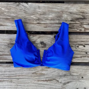 top amapola azul rey